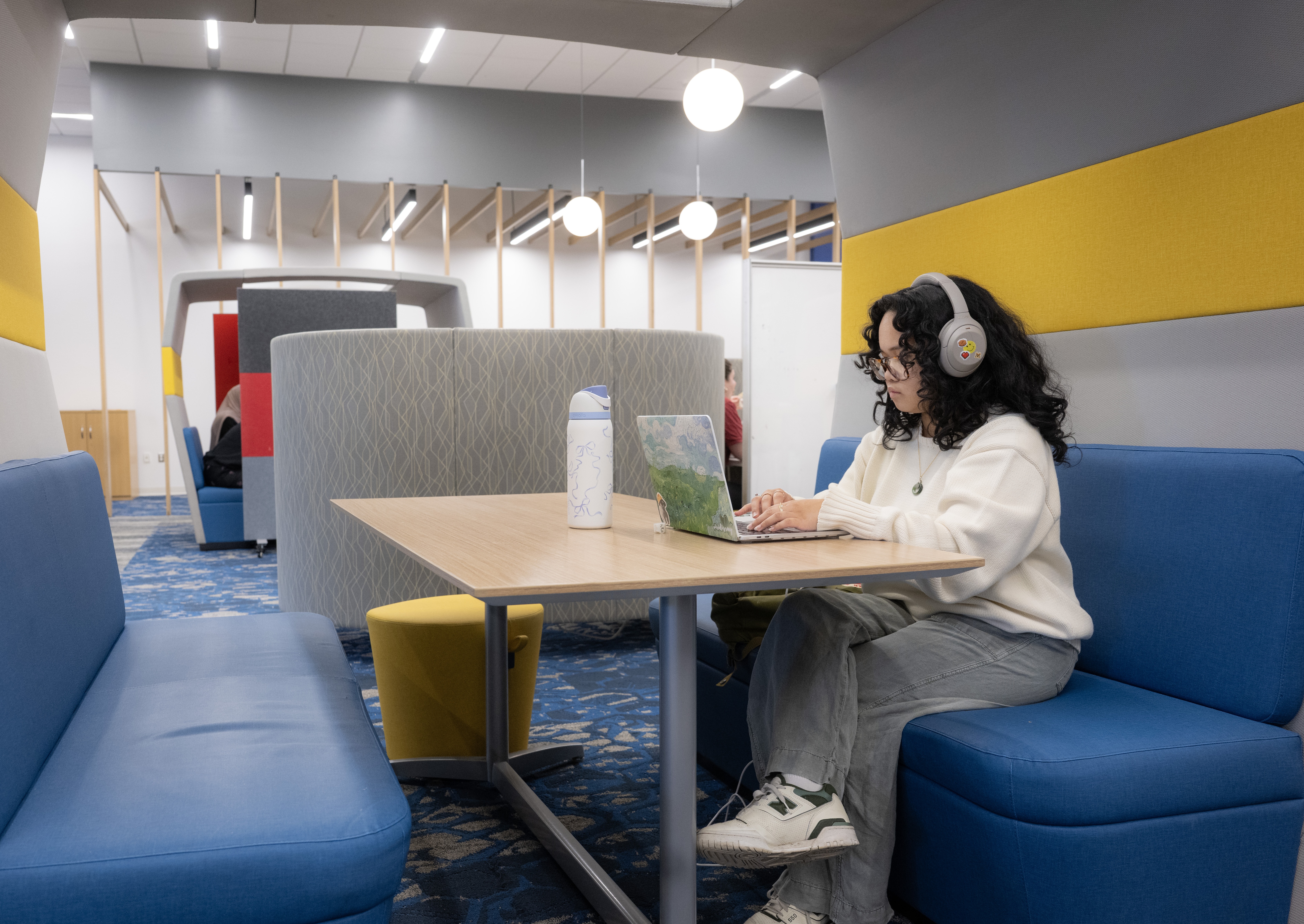 Original Caption: Rayanna Lam (SAS '27) studying in the Digital Learning Commons at Alexander Library on College Ave campus.