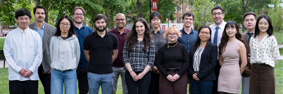 Group photo of graduate cohort in front of linguistics building